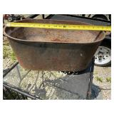 Vintage cast-iron four legged cauldron