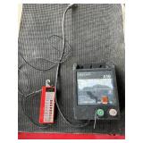 Electric fence charger/ voltage tester