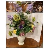 Artificial floral arrangement in vase