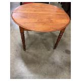 Antique wooden round table on rollers 44'