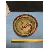Pottery bowl signed