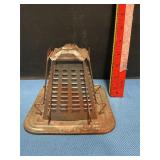 Vintage metal stove-top toaster