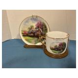 Thomas Kincaid cup and saucer w display
