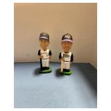 Two river bats bobble heads