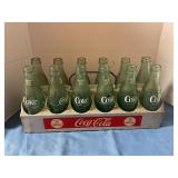 Vintage Coca-Cola 12-bottles in aluminum carrier