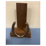 Wooden horseshoe paper plate holder