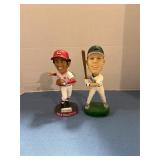Cincinnati Reds and dragons bobble heads