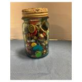 Mason jar of buttons pint size