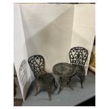 Little metal table and chairs