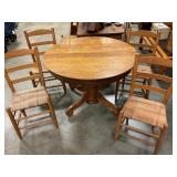 Oak pedestal table w/ 4ladder back chairs