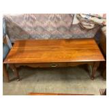 Coffee table with draw