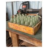 Wooden grate of Coca-Cola bottles