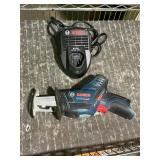 Ryobi saw and charger