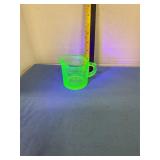Uranium depression glass measuring cup