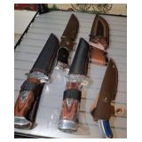ASSORTED SHEATHED HUNTING KNIVES ASSORTED SHEATHED HUNTING KNIVES