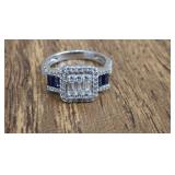 MARKED .925 BLUE & CLEAR STONE RING