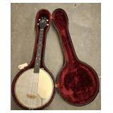 THE GIBSON TRAP DOOR 4 STRING BANJO, HAS SIGNATURE