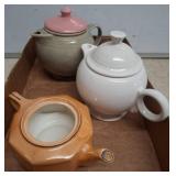 Three Ceramic Teapots in Various Styles