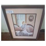 Framed Print of Girl Reading on a Sofa