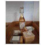 Bottle of Vanilla Syrup and Assorted Soaps