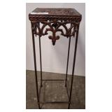 Cast Iron Plant Stand With Decorative Top et room