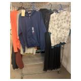 Rack of Assorted Clothing and Outerwear