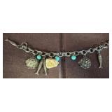 Metal Charm Bracelet With Fish and Natural Accents