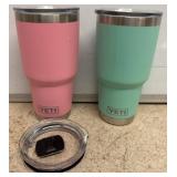 Two YETI Tumblers with Lids