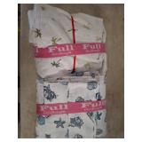 Two Full-Size Decorative Bedding Sets