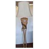 Floor Lamp With Ceramic Base and Metal Leaf Detail