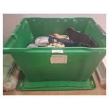 Green Bin With Assorted Footwear