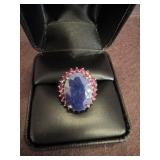 Oval Blue Gemstone Ring with Red Accents