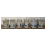 Six Metal Spice Tins with Porcelain Knobs