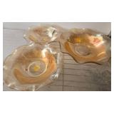 Three Amber Glass Bowls with Floral Motif