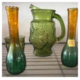 Green Glass Pitcher and Amber-Tinted Vases