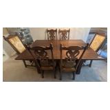 Dark Wood Dining Table with Six Upholstered Chairs