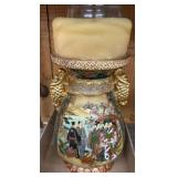 Decorative Vase with Ornate Handles and Design