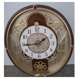 Round Musical Wall Clock With Decorative Face