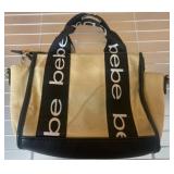 Bebe Straw and Faux Leather Handbag