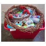 Plastic Bin With Craft Supplies and Wreath
