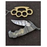 Folding Knife and Brass Knuckle Paperweight