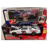 Two 1:24 Die-Cast Racing Champions Cars