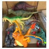 Dinosaur and Charizard Figurines