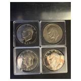 Four Eisenhower Dollar Coins in Cases