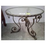 Round Glass-Top Table with Metal Scroll Base