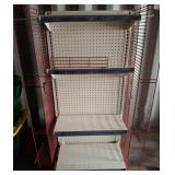Metal Display Rack with Red Wire Panels on Wheels