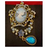 Gold-Tone Cameo Brooch With Blue Accents