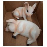 Two Porcelain Pig Figurines