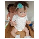 Two Realistic Baby-Style Dolls in Outfits