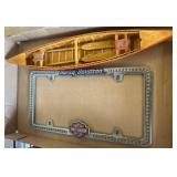 Harley-Davidson Plate Frame and Wooden Canoe Model